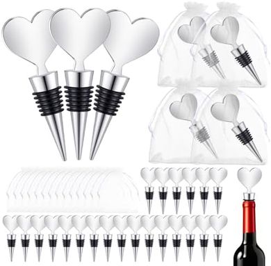 Silver heart-shaped wine & beer stoppers with organza bags – wedding favors.
